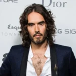 Russell Brand’s High-Profile Sexual Offence Trial in London Delayed to October Amidst Charge Consolidation.