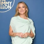 Kate Hudson Defines Contemporary Red Carpet Elegance in a Sculptural Sportmax Ensemble with High Slit and Geometric Cutouts