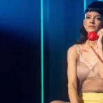 Lily Allen Revitalizes Retro Aesthetics with Sheer Fashion Ensembles During Global Performs West End Girl Tour