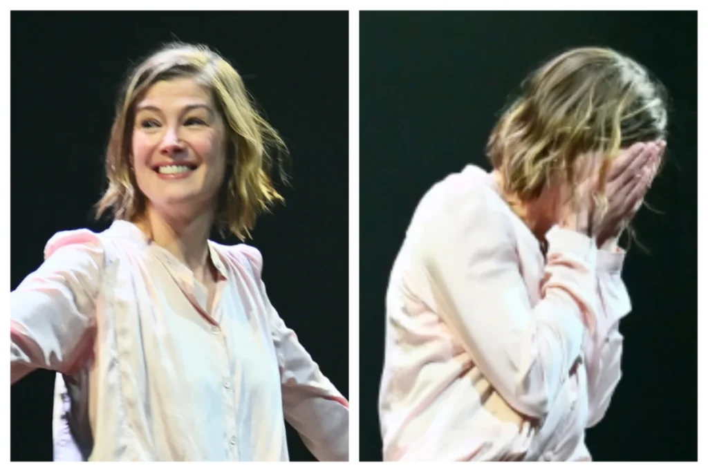 Rosamund Pike fights back tears during curtain call of London play Inter Alia