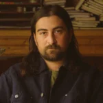 The Great Divide: Noah Kahan Expands Fourth Studio Album with Surprise Drop