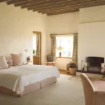 The Rise of Slipcovered Bed Frames in Modern Interior Design and the Shift Toward Low-Profile Bedroom Aesthetics