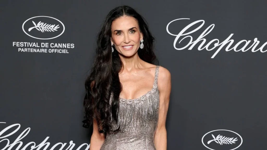 Demi Moore Captivates at Chopard Gala in Plunging Tamara Ralph Crystal Gown and Ostrich Feather Stole
