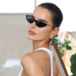 Maura Higgins Redefines Red Carpet Elegance in a Plunging White Gown with Dramatic Cutouts at Sports Illustrated Swimsuit Event