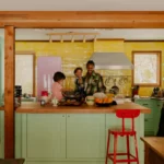 Yellow Tile, Green Cabinets, and a Pink Fridge Set the Tone for a Family’s Woodstock, New York, Home