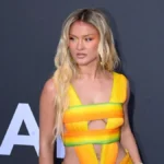 Zara Larsson Captivates at the amfAR Gala Cannes in Archival Roberto Cavalli Amid a Resurgence of Vintage Red Carpet Fashion
