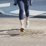 Mysterious Manhole Entrances Spark Investigations and Public Speculation Across New York City.