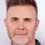 Gary Barlow Signals End for Take That’s ‘The Circus Live’ Tour Due to Physical Demands, Reflecting on an Era-Defining Spectacle.