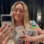 Hilary Duff Redefines Modern Beach Aesthetic in Dramatic Cutout Swimsuit for Sports Illustrated Feature