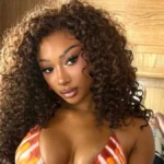 Megan Thee Stallion Showcases High Fashion Evolution in Daring Dreaming Eli Ensemble During New York City Appearance