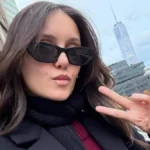Nina Dobrev Showcases Sophisticated Glamour in a Dramatic Plunging Black Gown for Her Viral Outfit Roulette Series