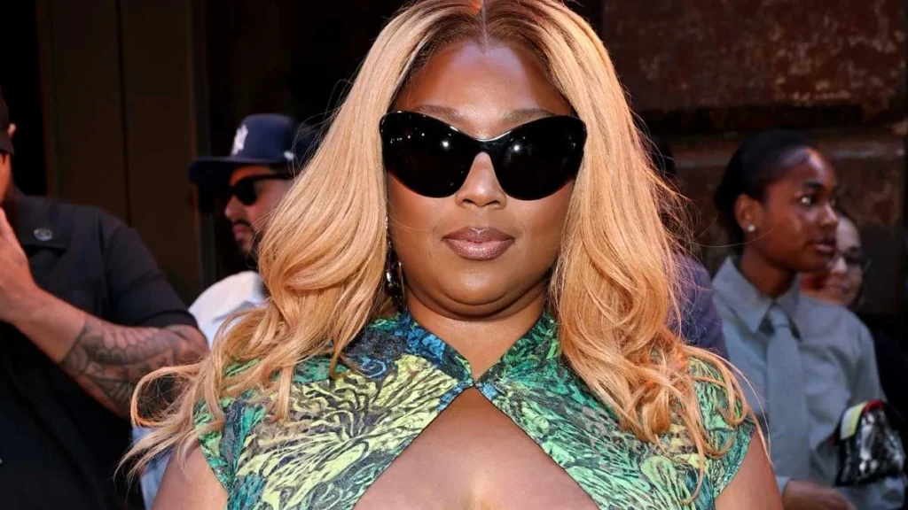 Lizzo goes bold in Kim Shui dress with plunging chest cutout and thigh-high slit at NYFW show