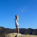 Sydney Sweeney has legs for days in tiny SYRN micro shorts and baby tee