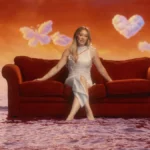 Hilary Duff flaunts her curves in body-hugging Coperni wet cutout dress for CATastrophe MV