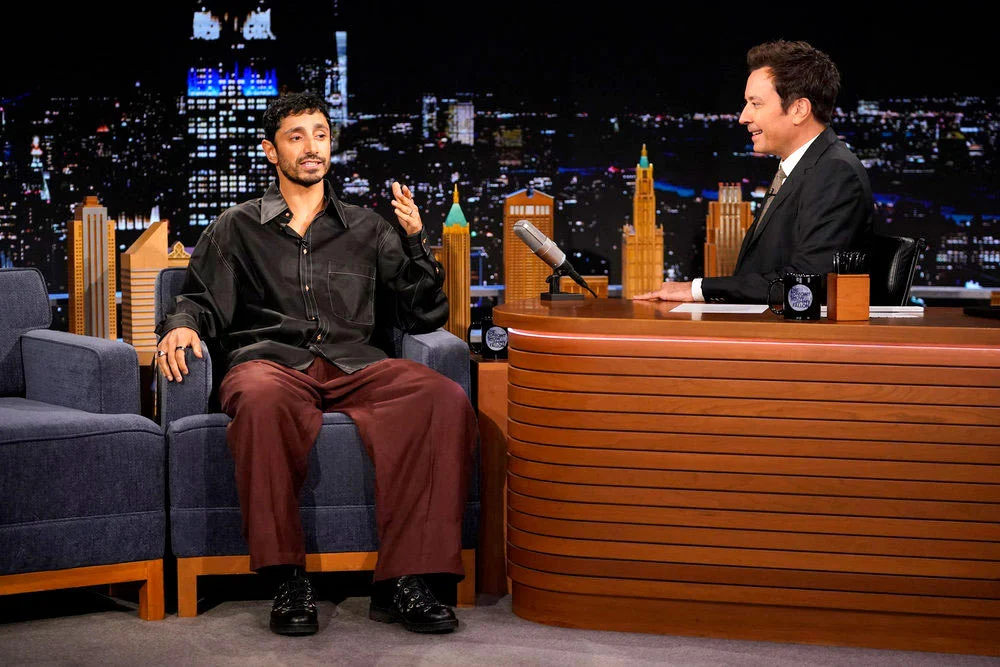 Riz Ahmed Debuts Avant-Garde Saint Laurent Look and Discusses Tom Cruise on The Tonight Show Starring Jimmy Fallon